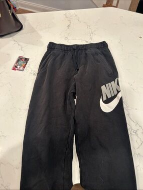 Nike Kids Black Sweatpants with White Swoosh Logo